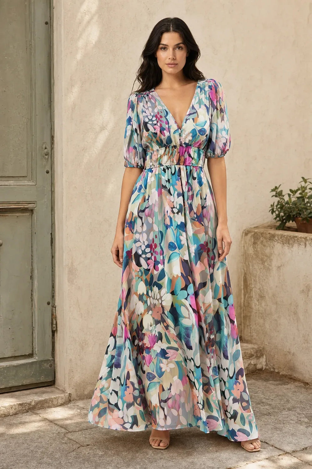 Floral chiffon midi dress on a model in a contrapposto stance
