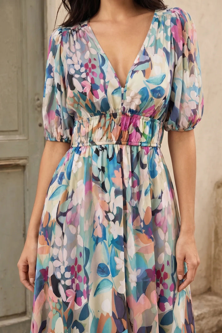Close-up detail of a floral chiffon midi dress