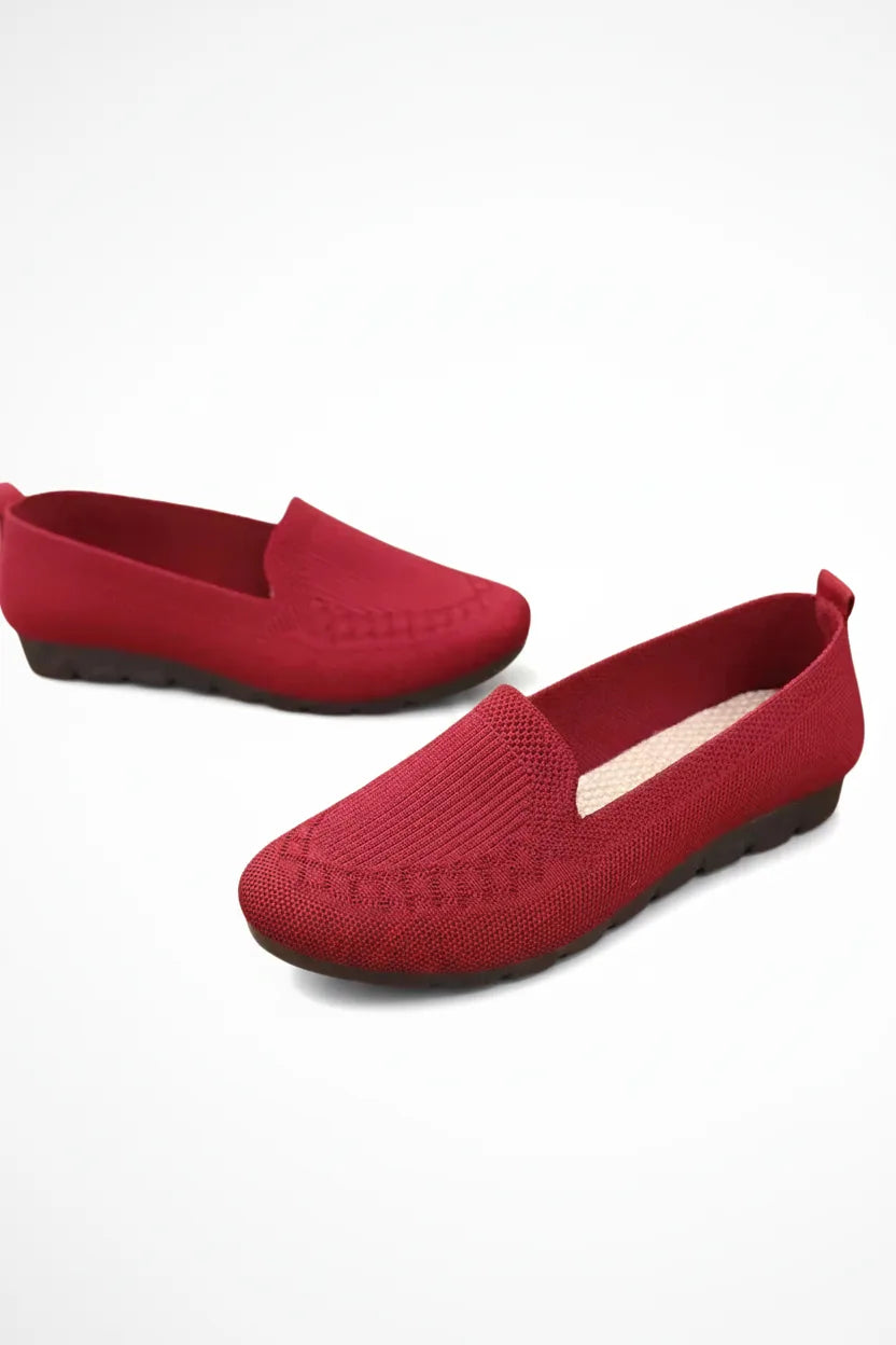 Red knit slip-on loafer, three-quarter angle view