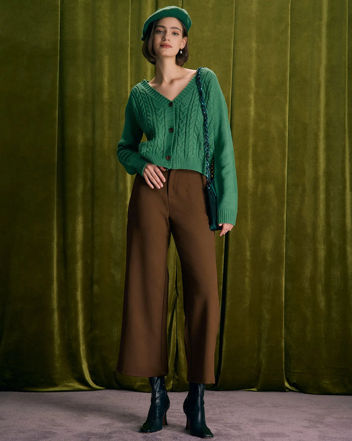 Wide-leg coffee brown trousers on model highlighting the full-length fit and flow