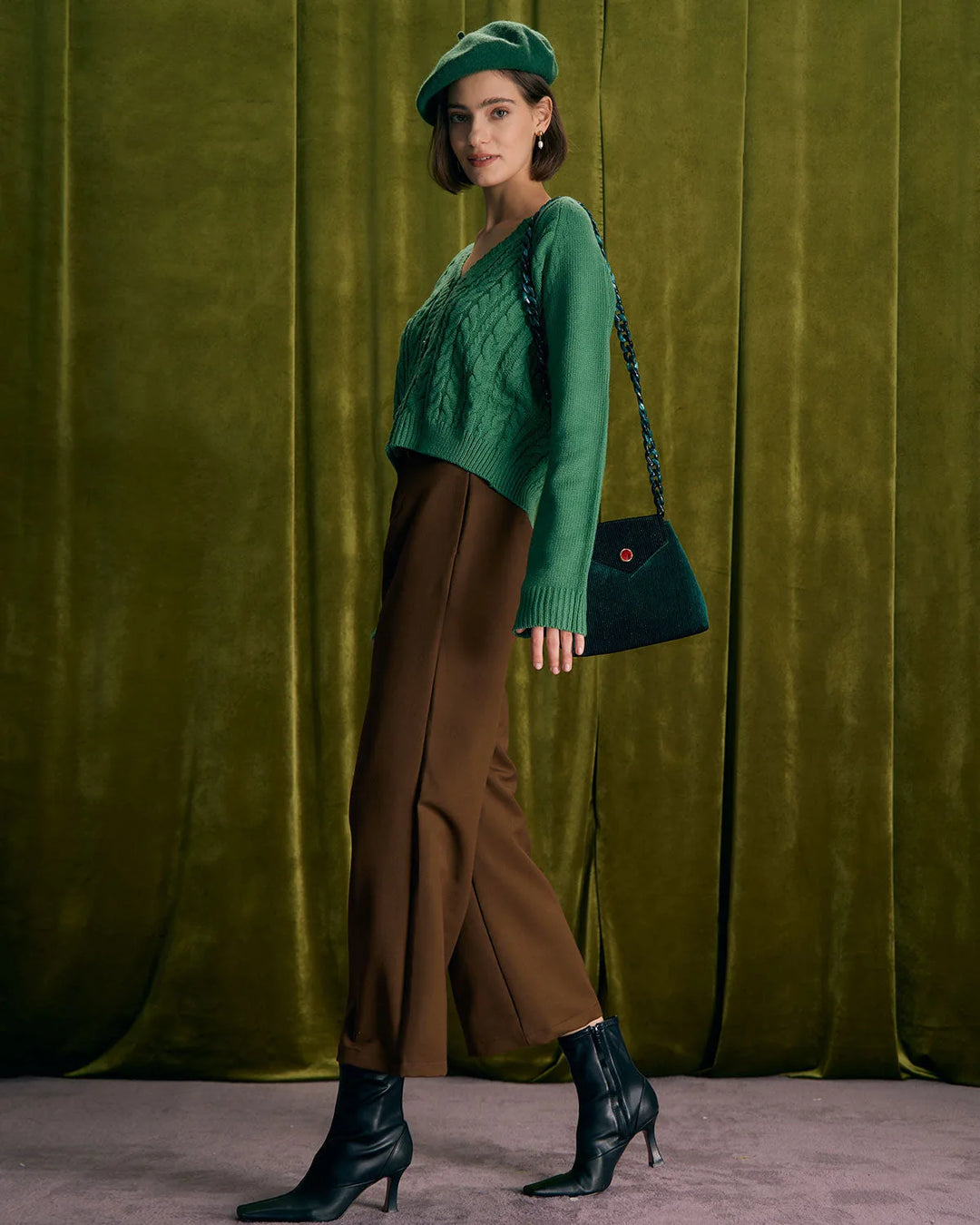 Model in wide-leg coffee brown trousers captured in an alternate styling or cropped view