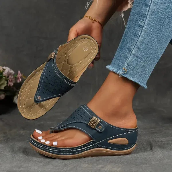 Blue wedge thong sandal, three-quarter angle view of straps and sole
