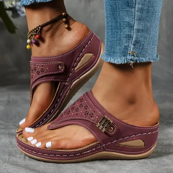 Bordeaux red wedge thong sandal, rear view focusing on wedge heel