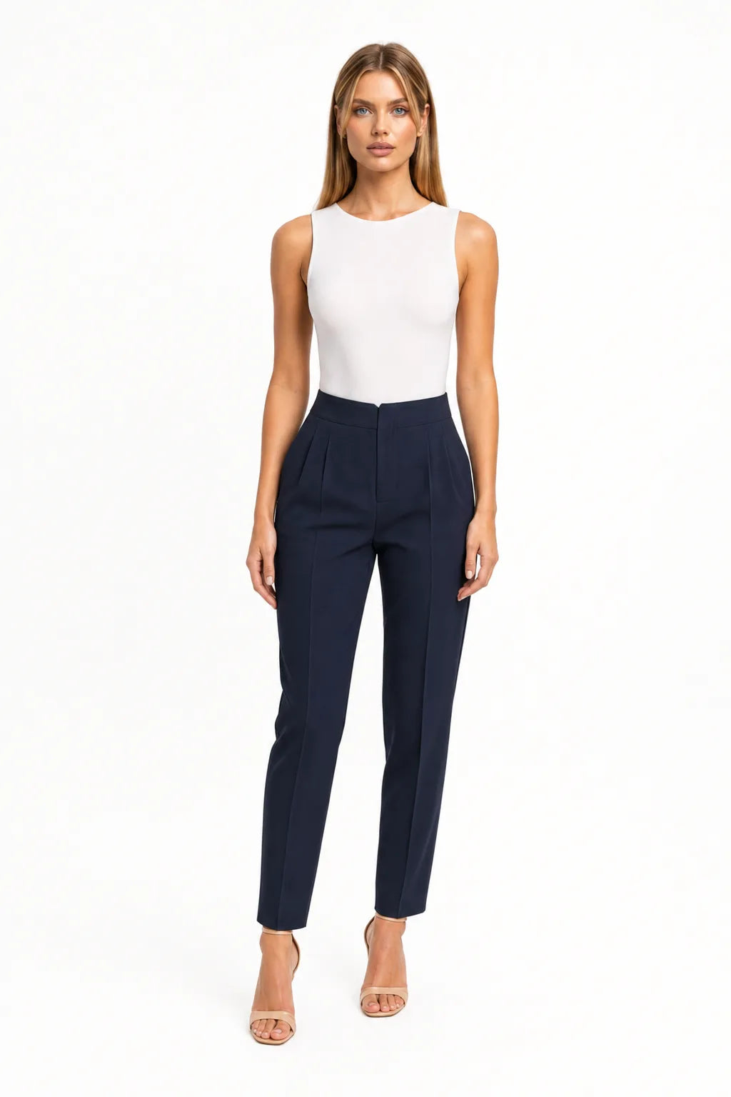 Royal blue pleated tapered trousers on a model in a contrapposto stance