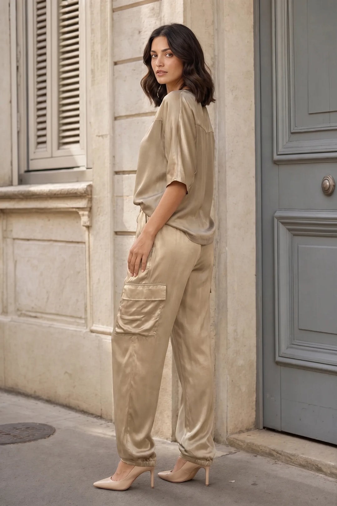 Gold satin cargo co-ord set on model in three-quarter turn
