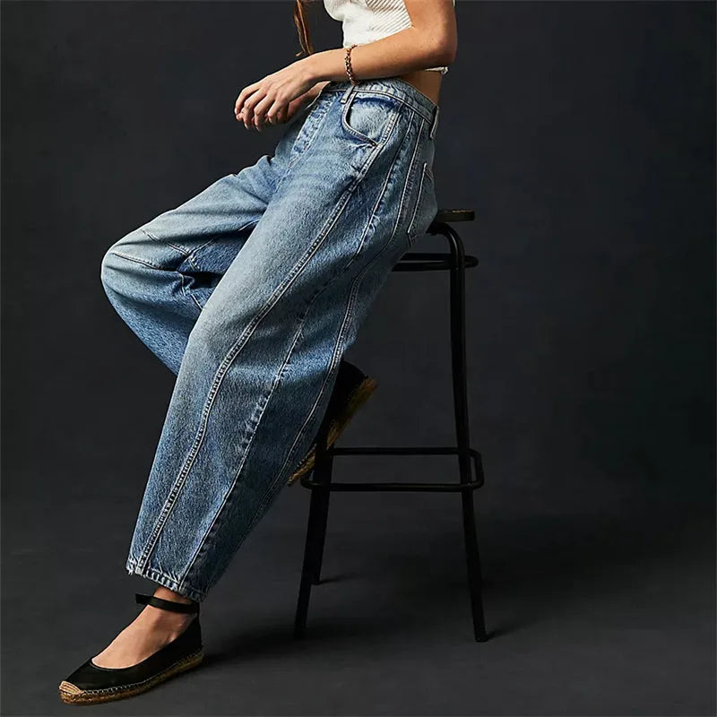 Light blue barrel leg jeans on model, full-length front-facing view