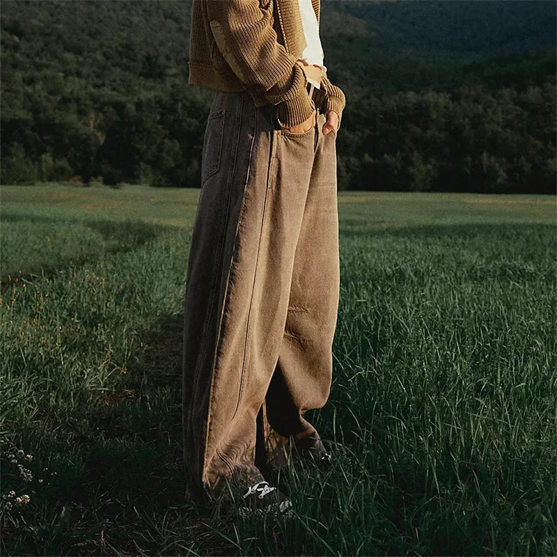 Light blue barrel leg jeans on model, full-length styled view from front