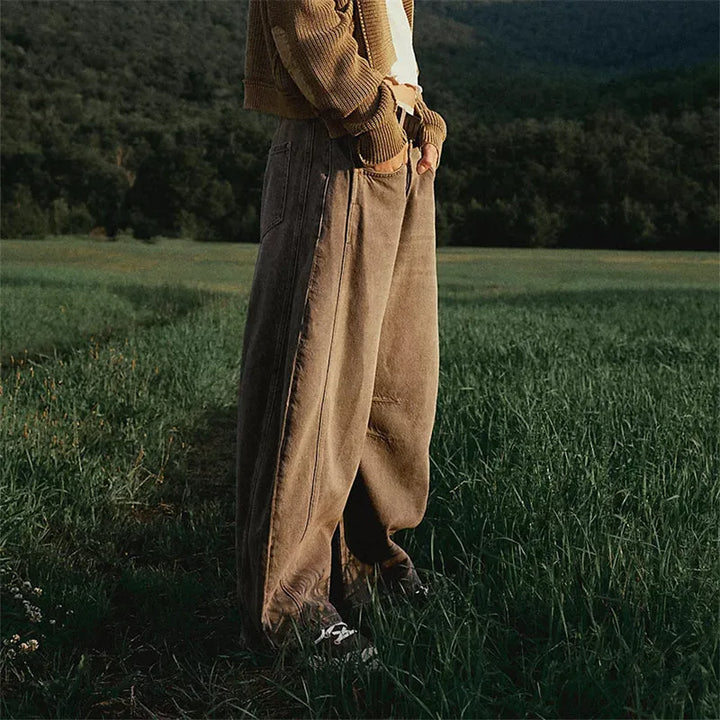 Light blue barrel leg jeans on model, full-length styled view from front