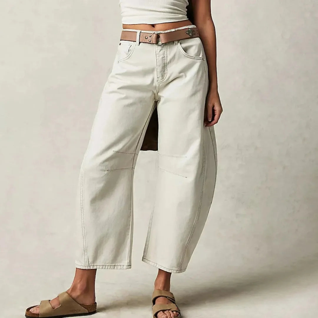 White barrel leg jeans on model, full-length view showing barrel-shaped leg
