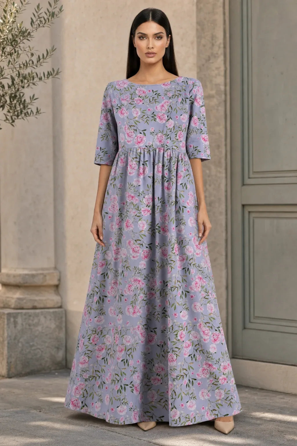 Dusty lilac floral midi dress on model in contrapposto stance