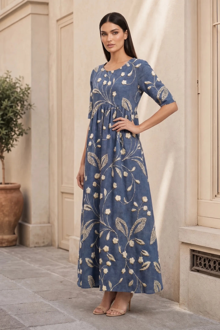Navy blue floral midi dress on model in three-quarter turn