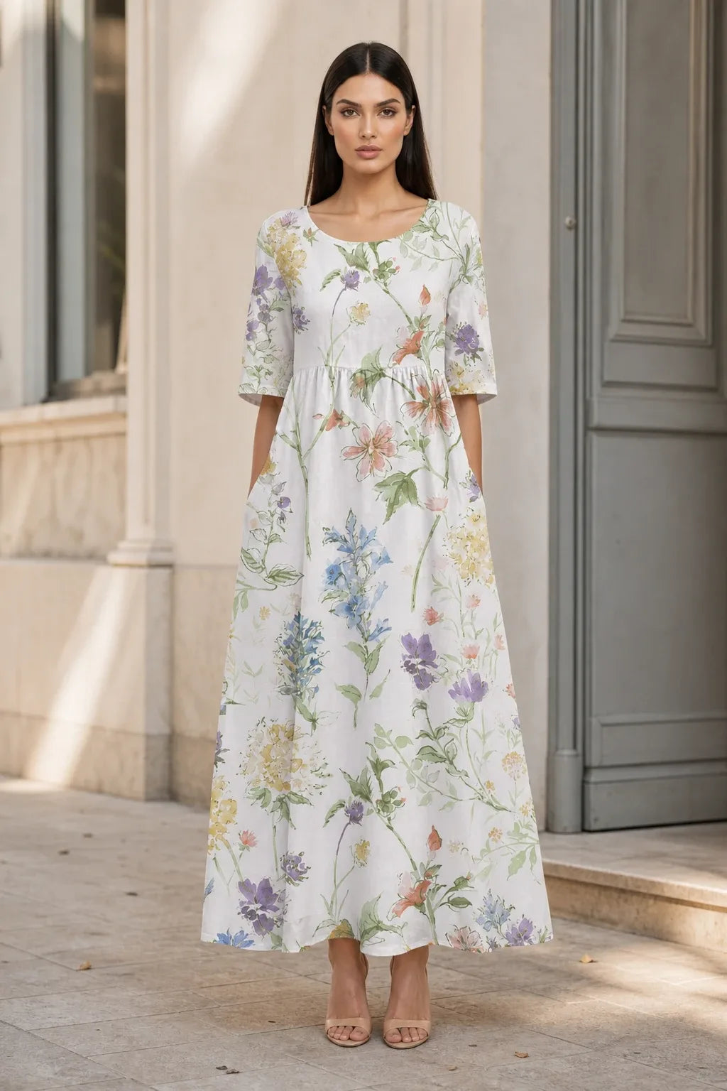 White floral midi dress on model in contrapposto stance