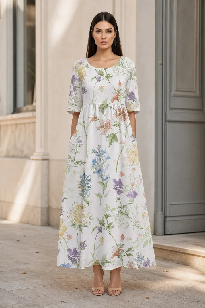 White floral midi dress on model in contrapposto stance