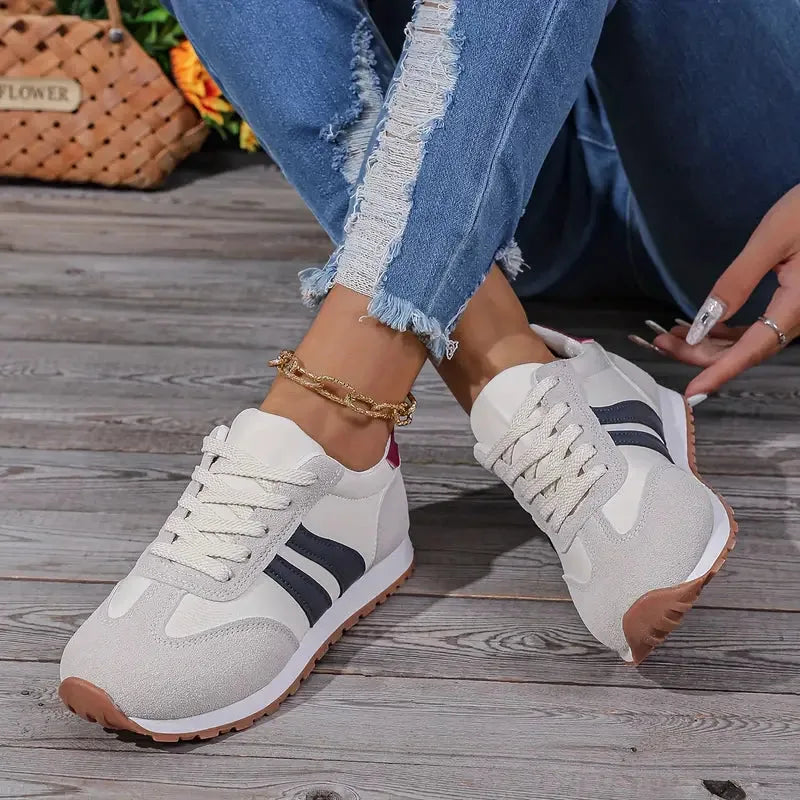 Navy blue retro runner sneaker, three-quarter angle view