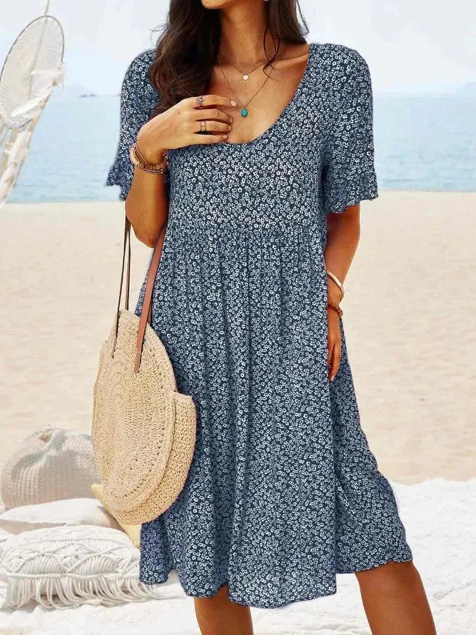Navy blue floral smock dress, model facing forward