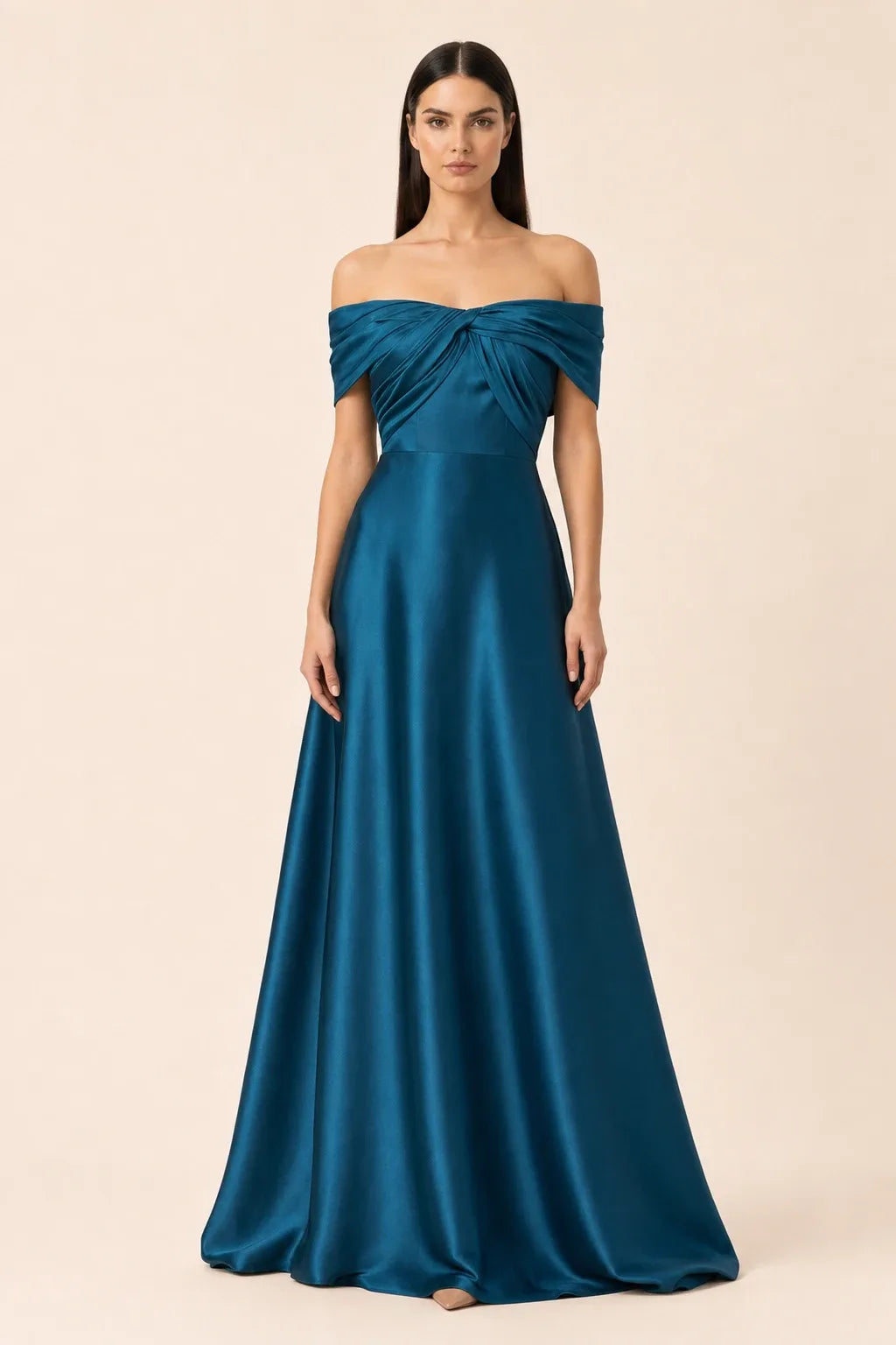 Woman in blue off-shoulder satin gown, weight shifted to one hip in contrapposto stance