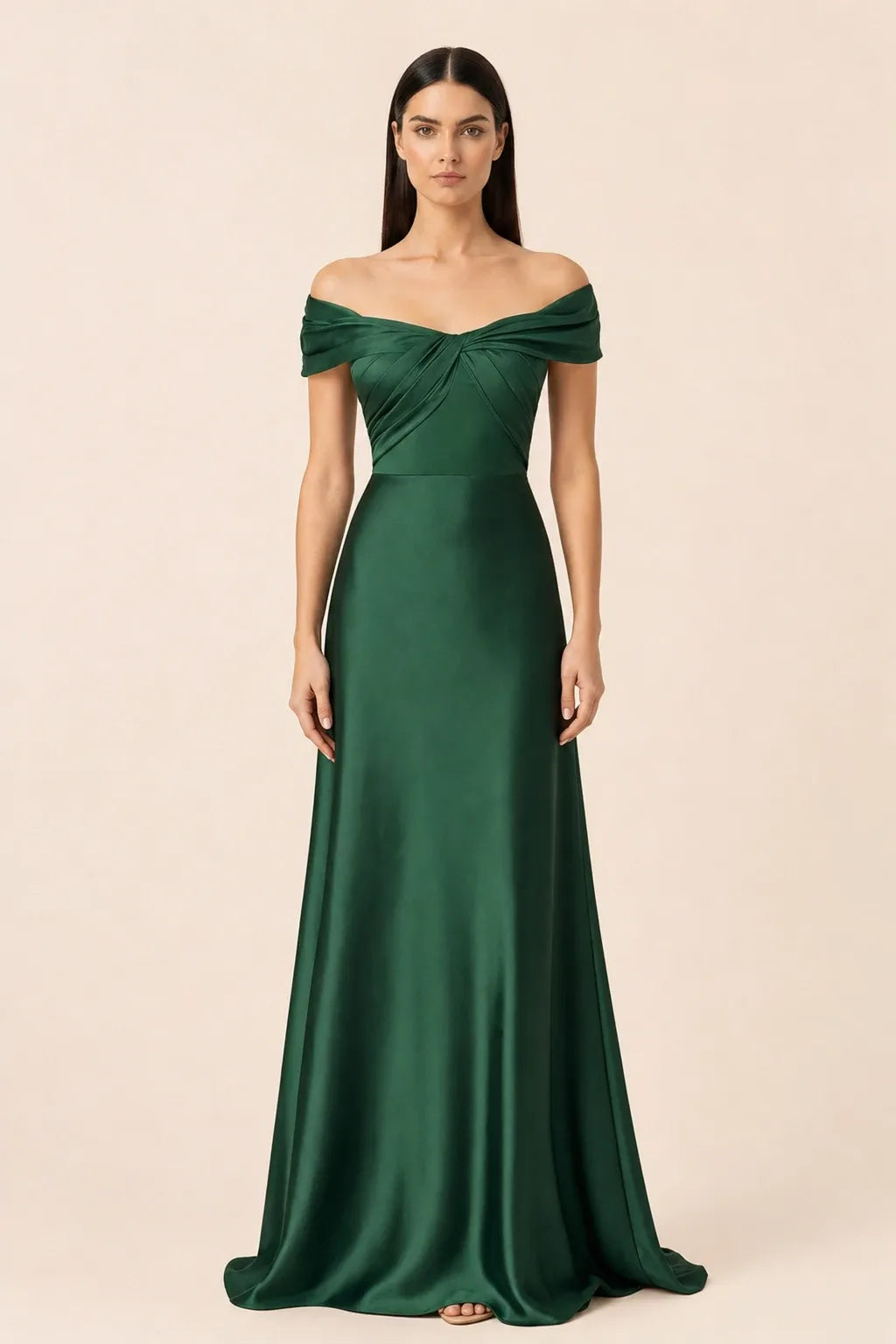 Woman in dark green off-shoulder satin gown, weight shifted to one hip in contrapposto stance