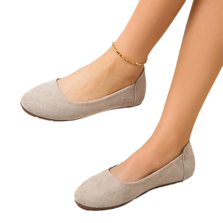 Green round toe ballet flat, three-quarter angle view