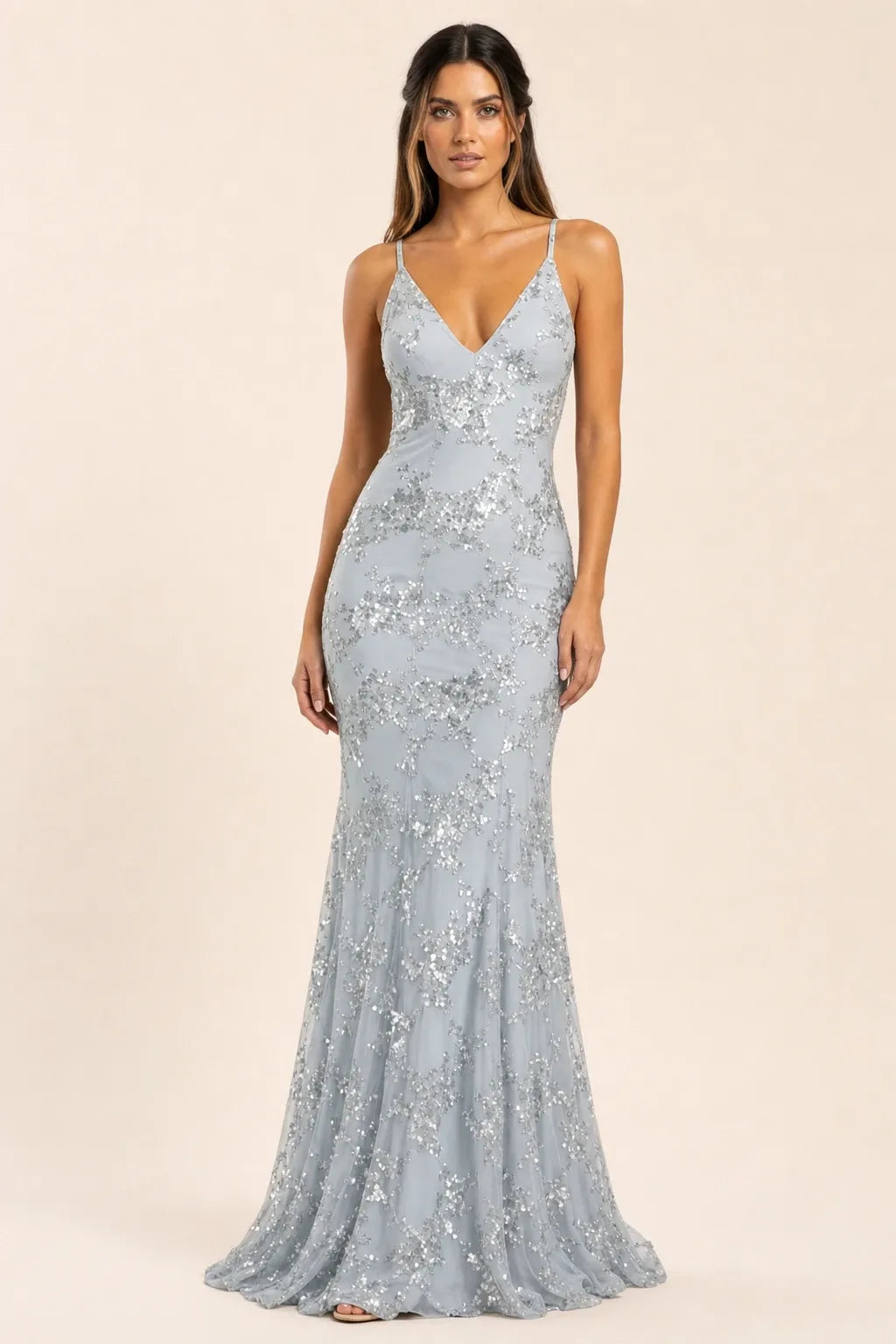 Grey sequin lace-up gown on model in contrapposto stance