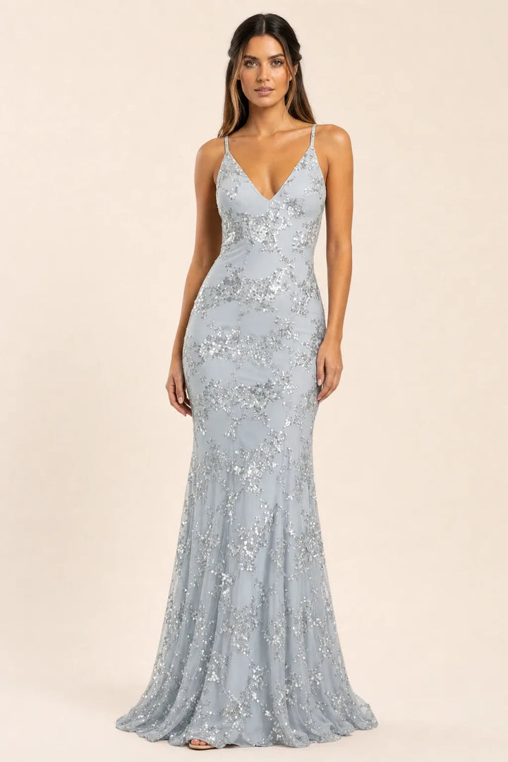 Grey sequin lace-up gown on model in contrapposto stance