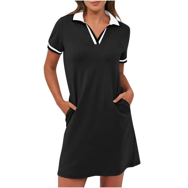 Black polo collar mini dress on model, three-quarter turn