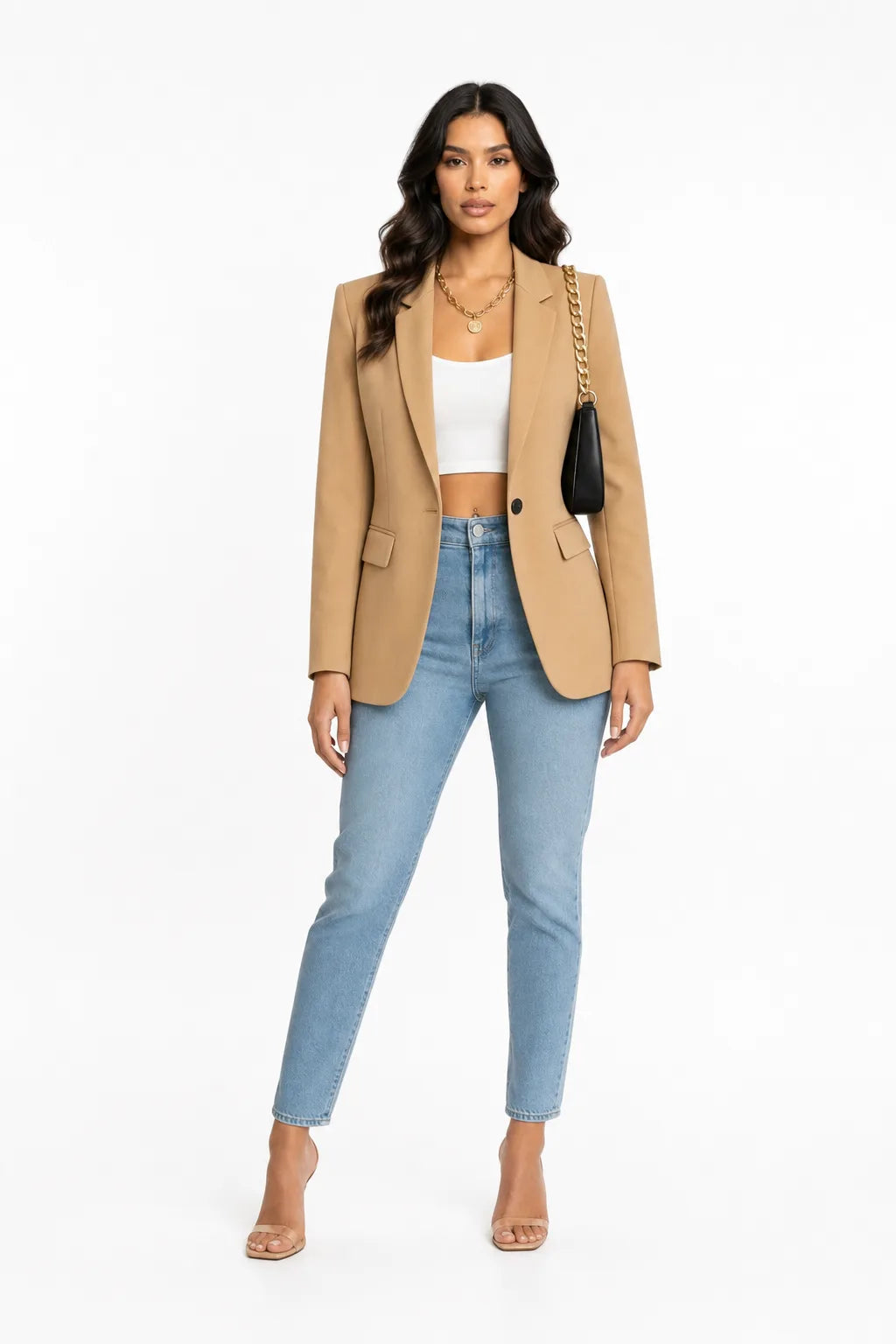 Beige tailored notch lapel blazer on a model in a contrapposto stance