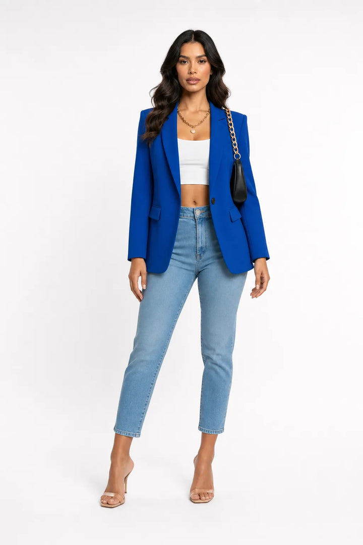 Blue tailored notch lapel blazer on a model in a contrapposto stance