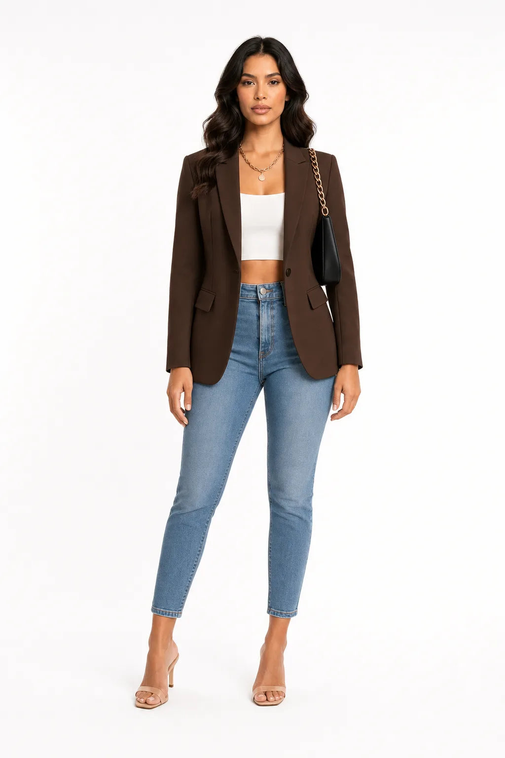 Brown tailored notch lapel blazer on a model in a contrapposto stance