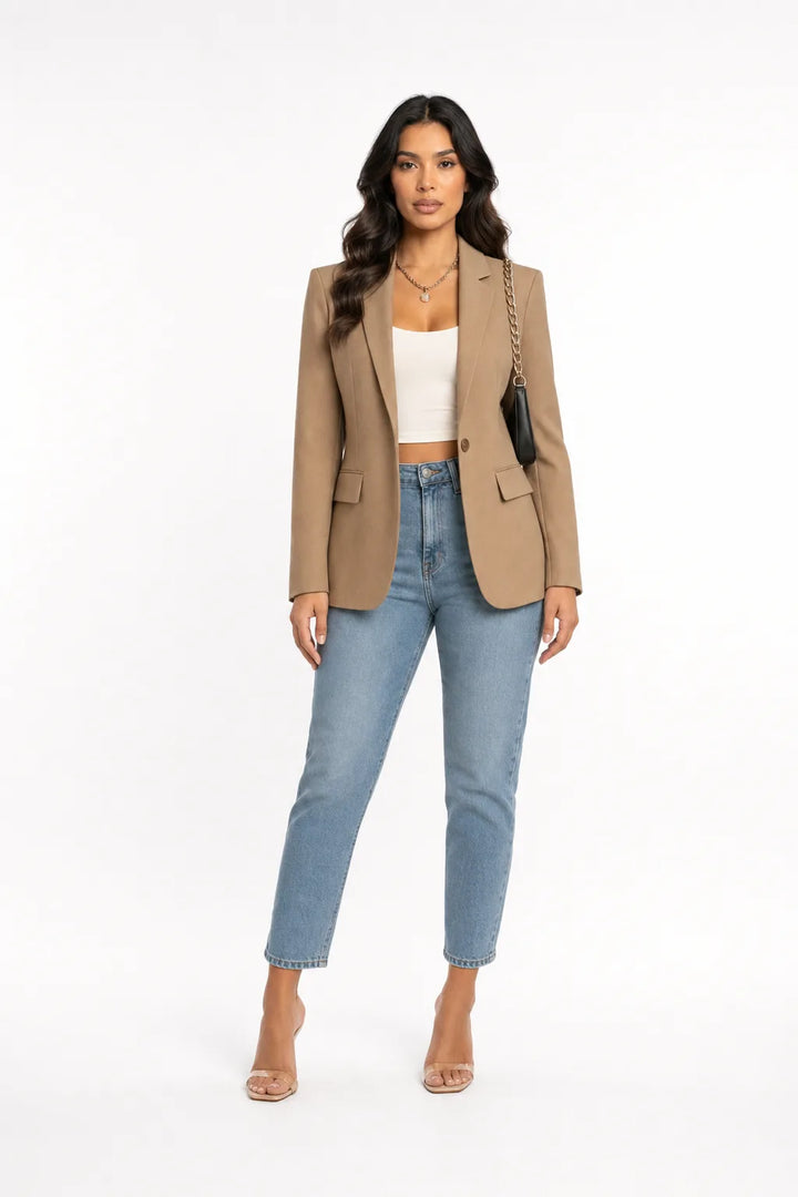 Khaki tailored notch lapel blazer on a model in a contrapposto stance