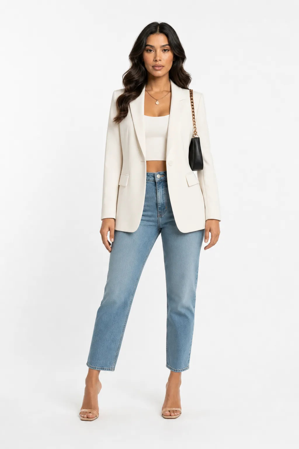 White tailored notch lapel blazer on a model in a contrapposto stance