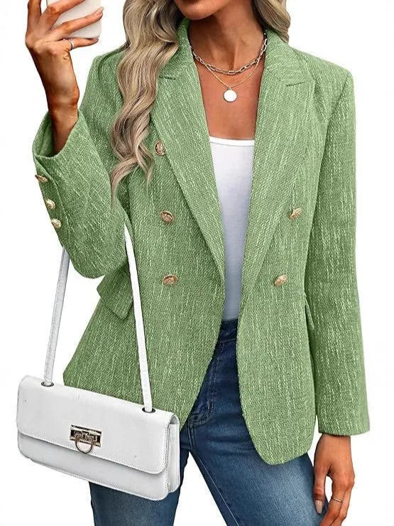 Green double breasted tweed blazer on model