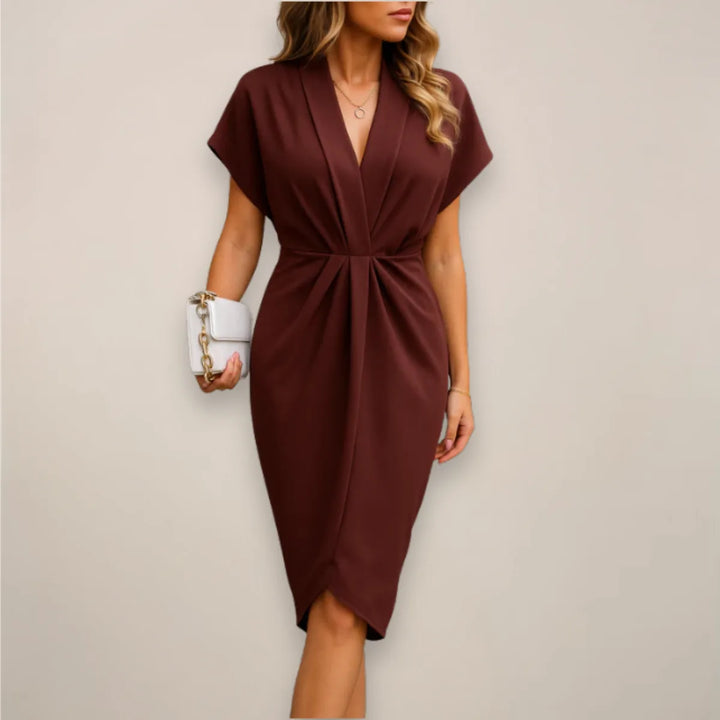 Burgundy twist front midi dress on standing model