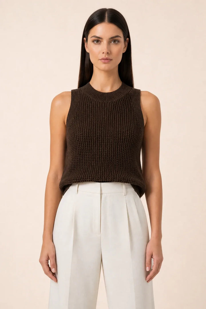 Brown open knit tank top on model in contrapposto stance