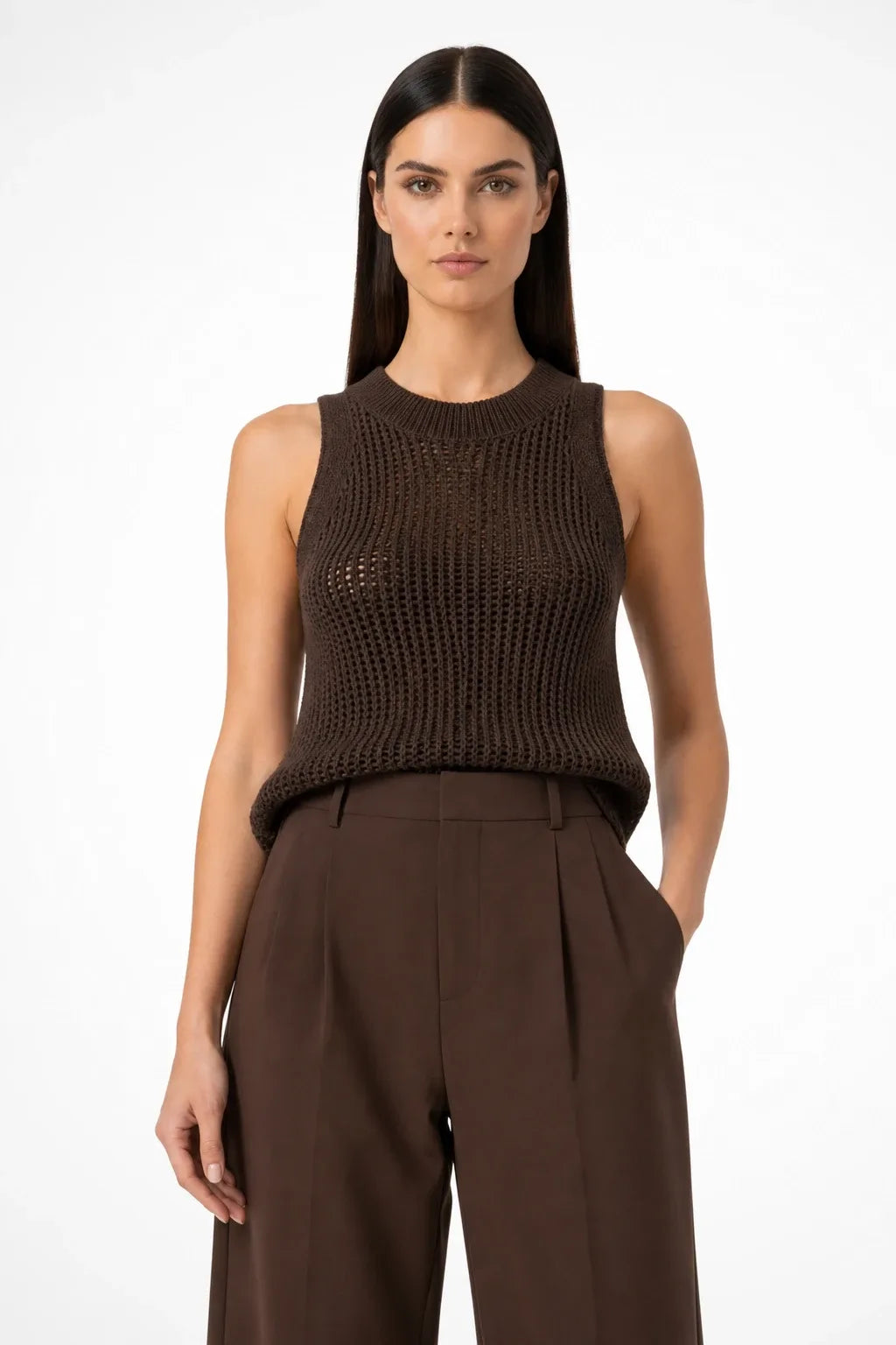 Dark brown open knit tank top on model in contrapposto stance