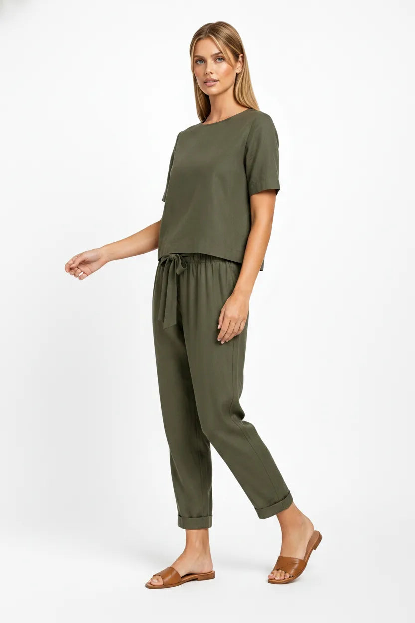 Army green linen crop top on model in natural relaxed movement