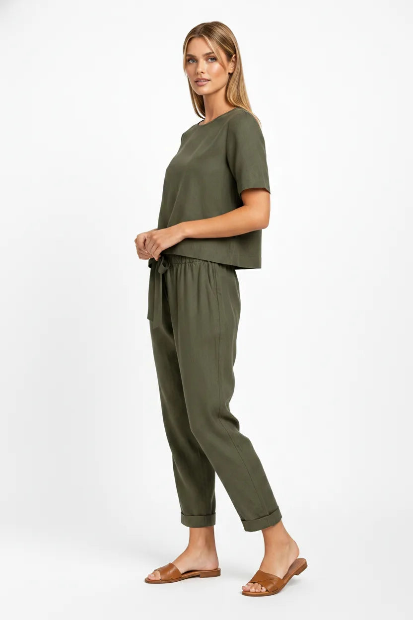 Army green linen crop top on model in three-quarter turn pose