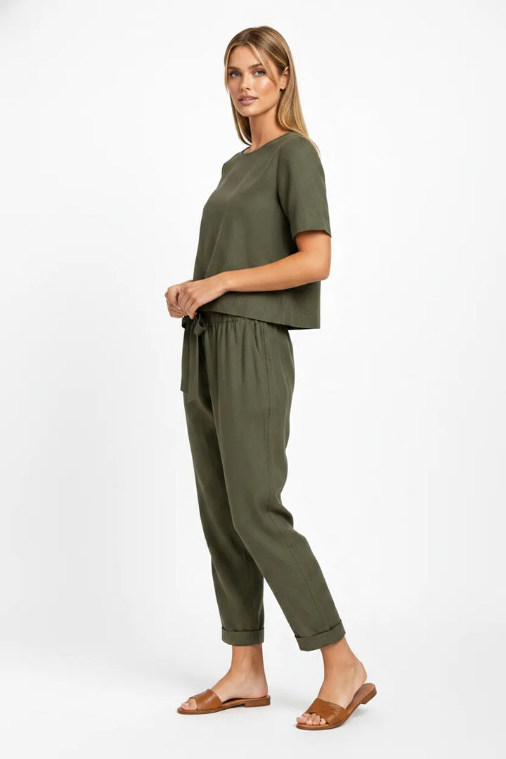 Army green linen crop top on model in three-quarter turn pose