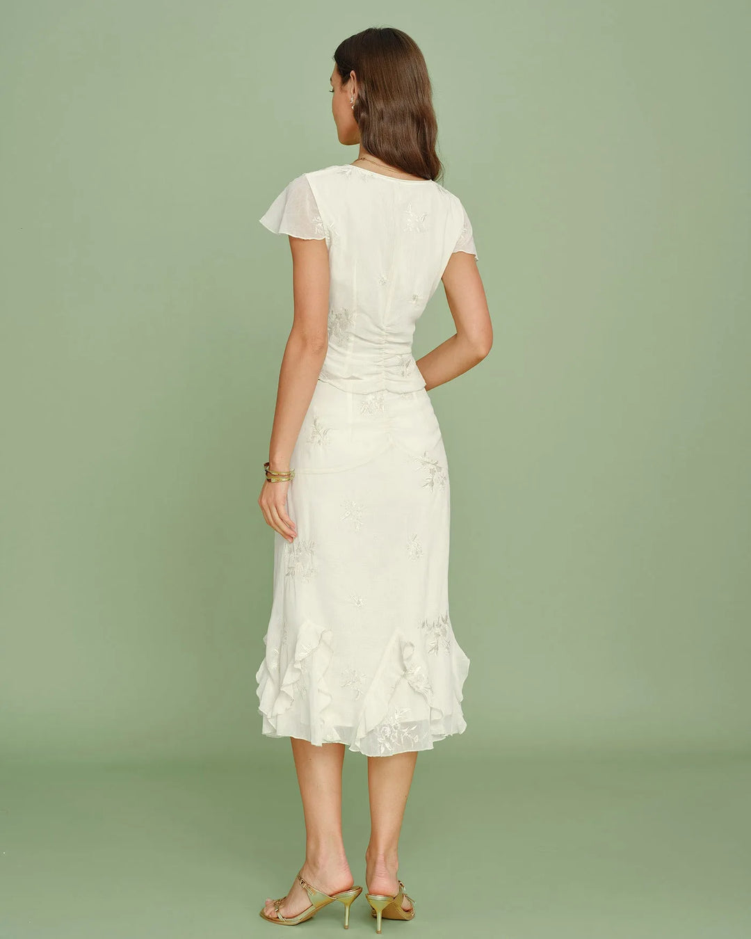 Apricot ruched embroidered midi skirt on model, additional view