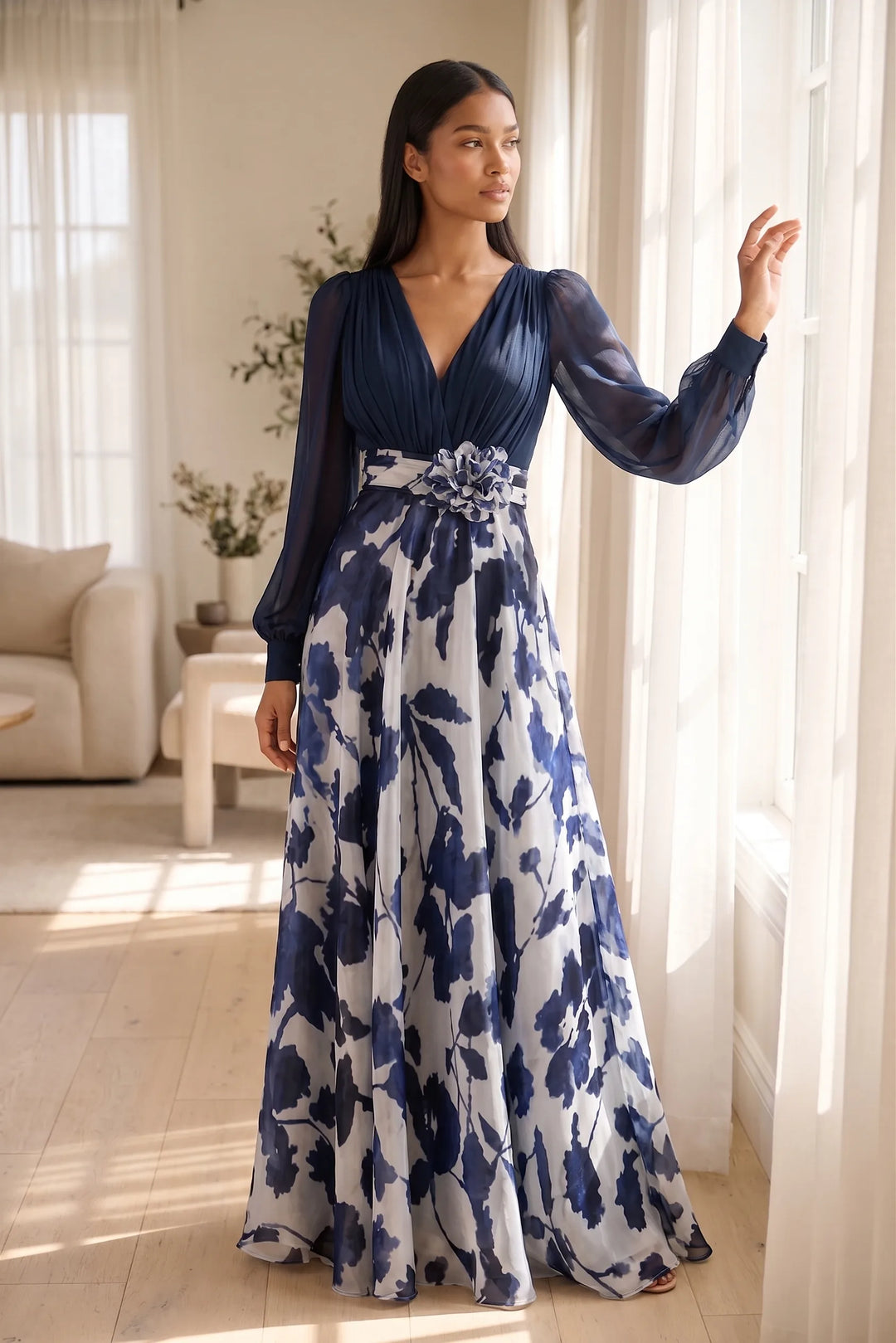 Model wearing a navy blue floral balloon sleeve maxi dress in a lifestyle setting