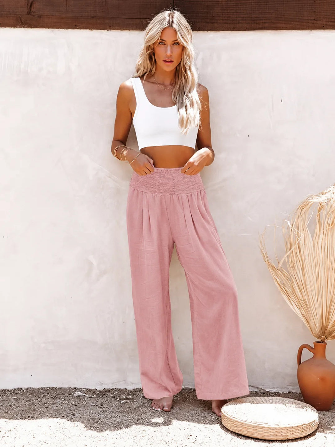 Khaki smocked wide leg pants on model, final styled view