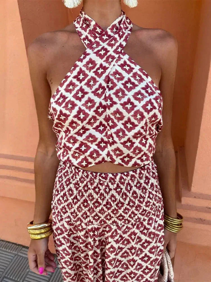 Red halter crop co-ord set on model at a three-quarter turn