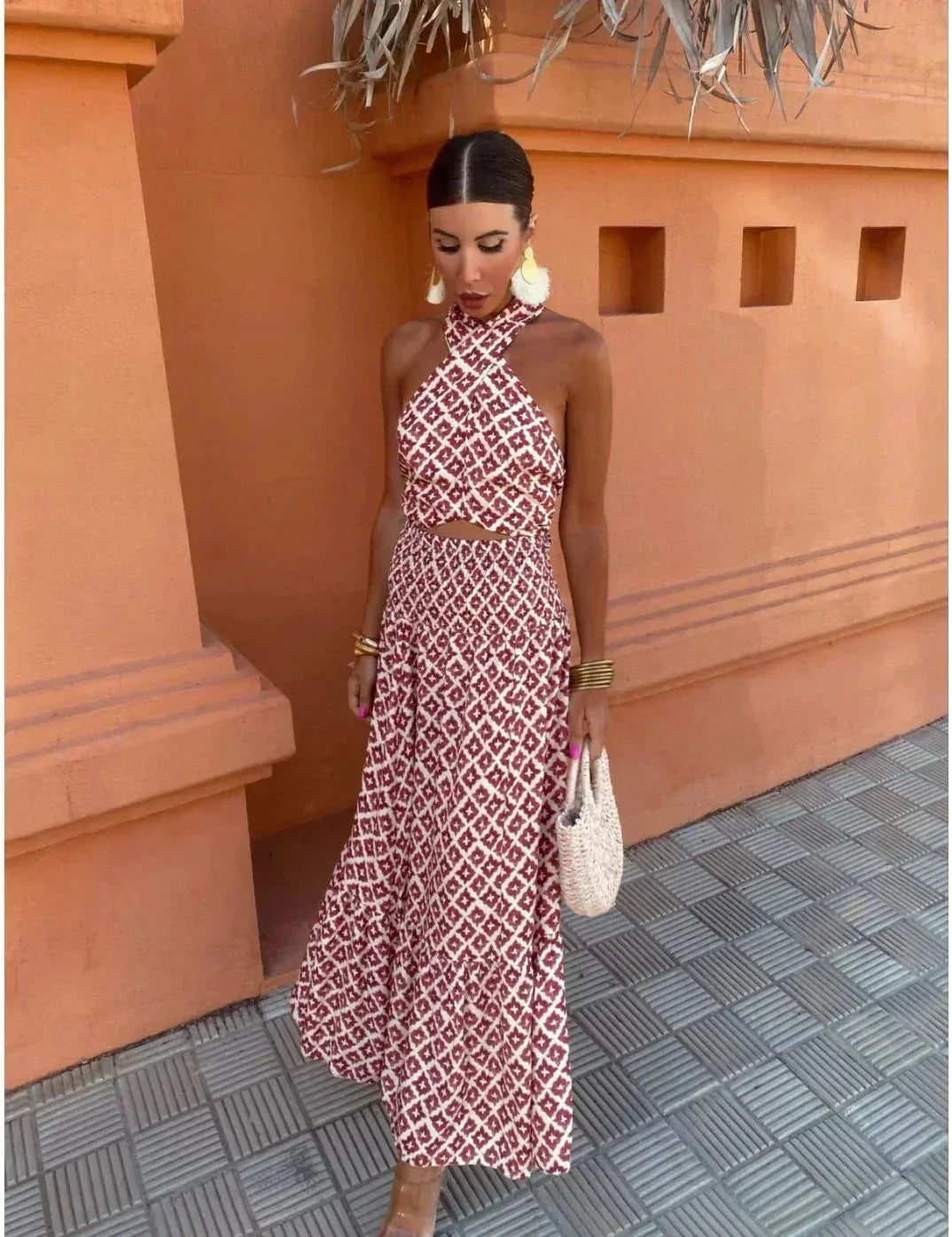 Red halter crop co-ord set styled on model in an alternate pose
