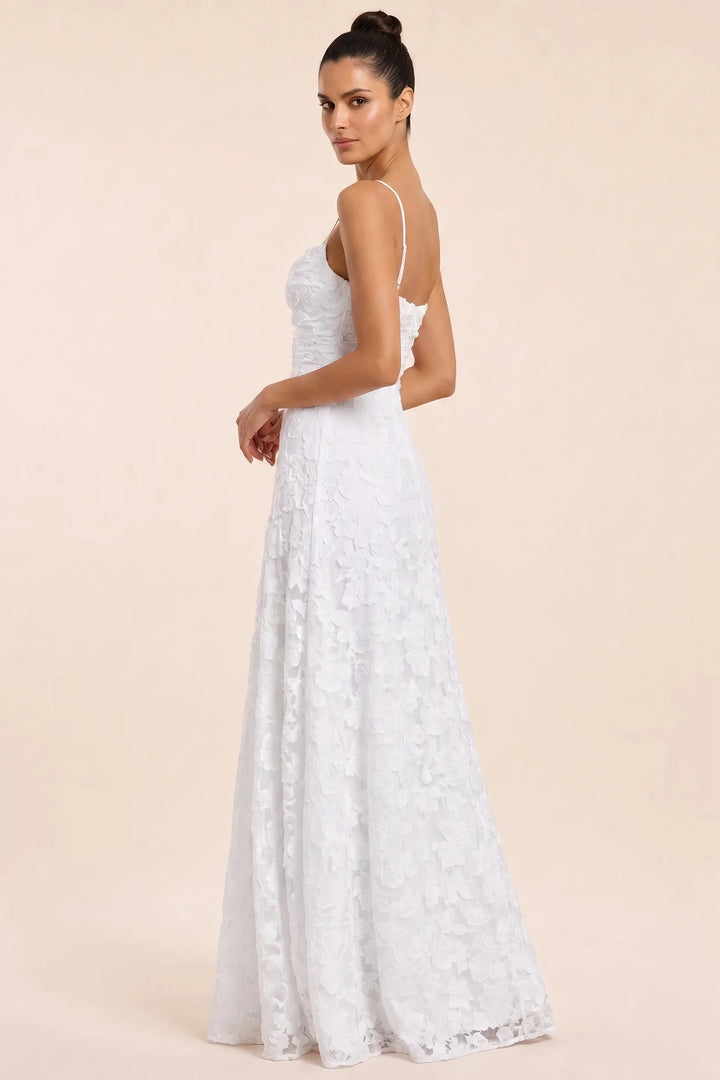 White jacquard ruched maxi dress on model in three-quarter turn