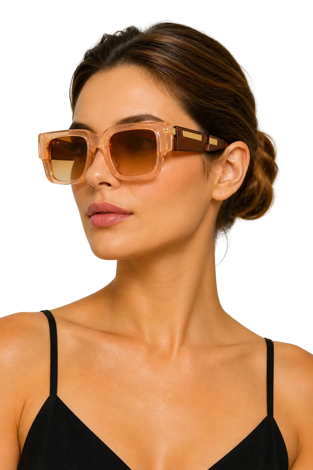 Model wearing oversized two-tone square sunglasses in brown, facing forward