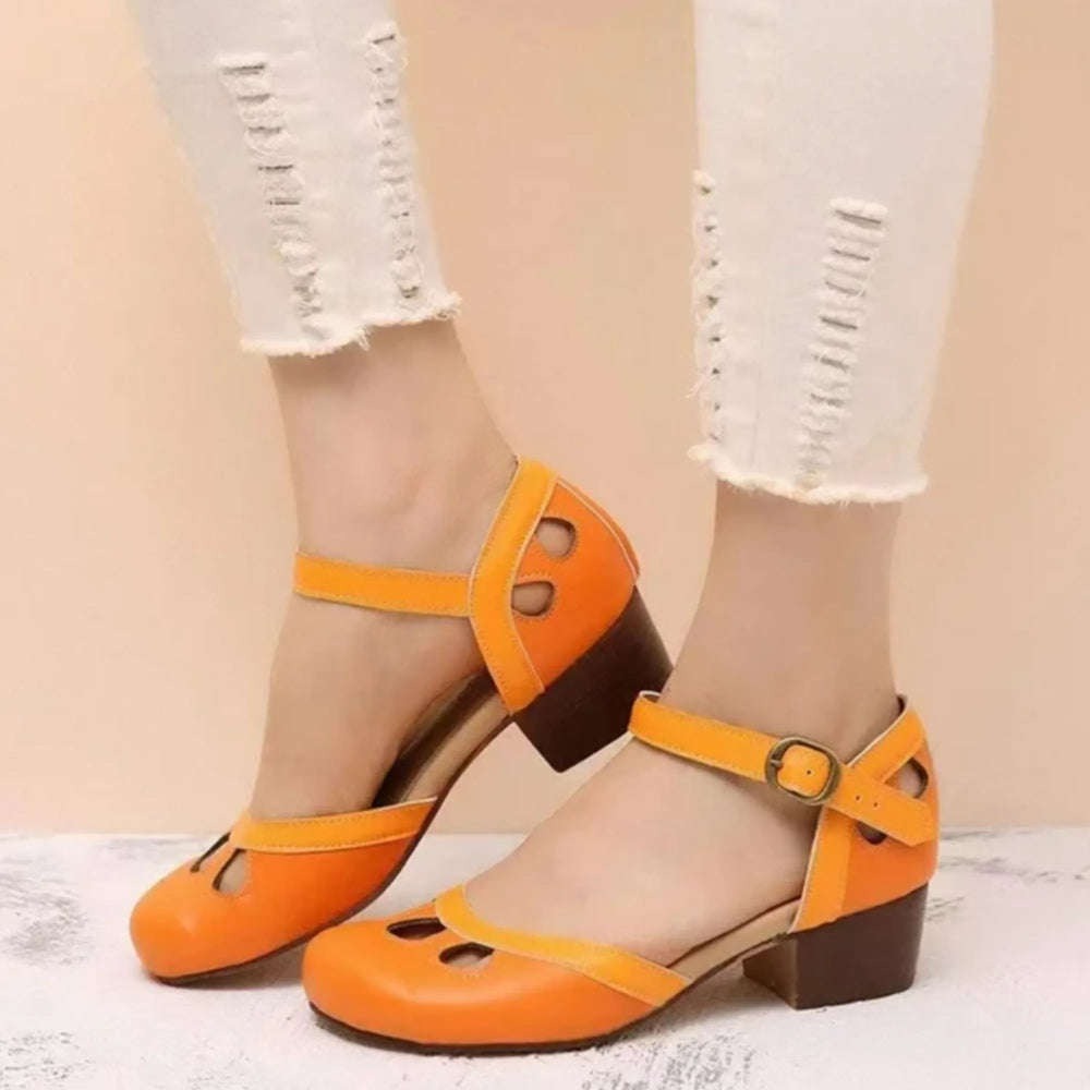 Orange cutout Mary Jane pump with block heel, front view