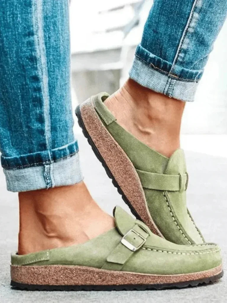 Sage green buckle strap clog mule, close-up detail of buckle strap