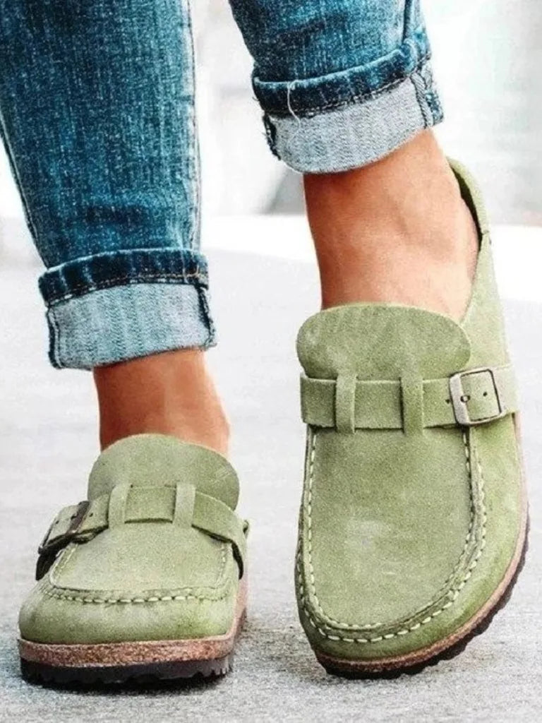 Sage green buckle strap clog mule, front view