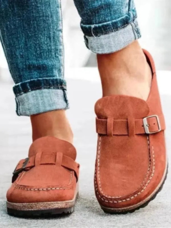Terracotta buckle strap clog mule, side profile view