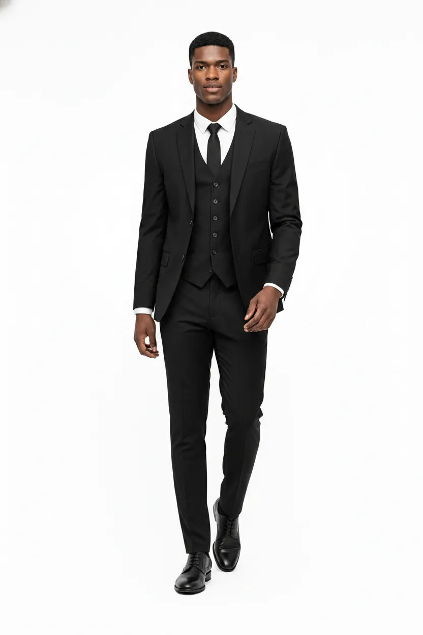 Black linen three-piece suit on a model in natural movement