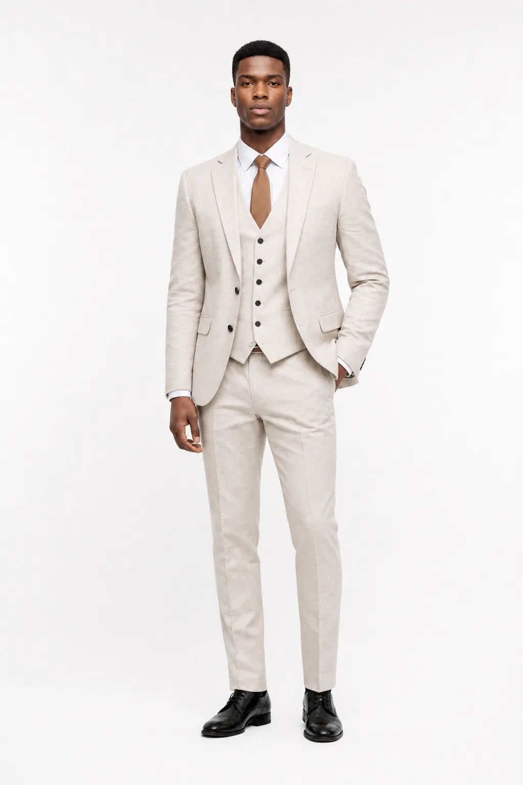 Ivory linen three-piece suit on a model in a contrapposto stance